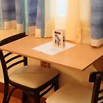 En Appartement *
